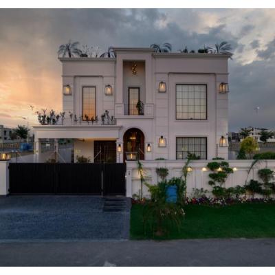 1 kanal House with 2 Floors, Partial Basement and 200 sq.ft extra covered area.