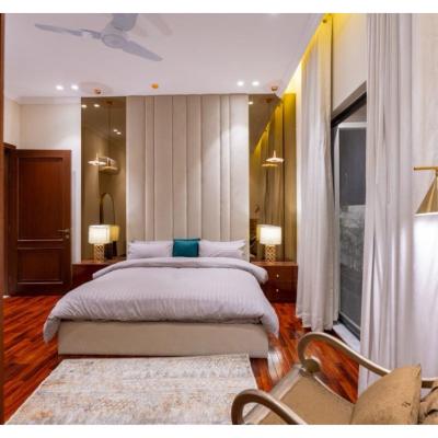 1 kanal House with 2 Floors, Partial Basement and 200 sq.ft extra covered area.