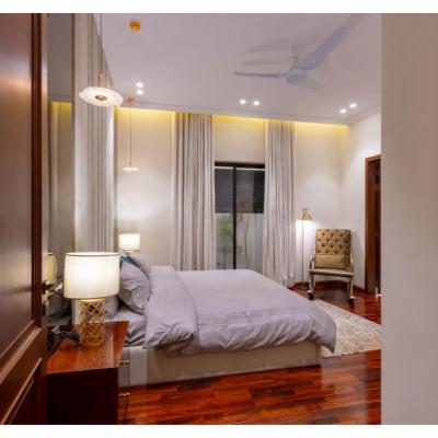 1 kanal House with 2 Floors, Partial Basement and 200 sq.ft extra covered area.