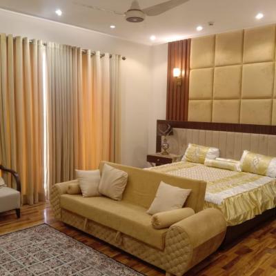 DHA Lahore phase 6 1 kanal house full furnished solar install corner house best location for rent