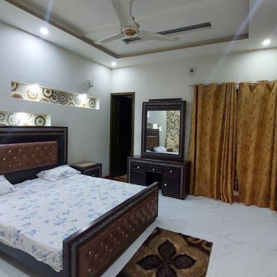 10 Lower Portion Fully Furnished 2 Bedrooms Drawing Room Tv Loungh Kitchen Totally Tiles Floor Hot Location