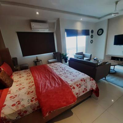 For Rent Defence Luxuery studio Apartment Near DHA Phase 4 Ring Road Lahore.